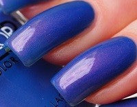 Nails painted with blue nail polish.