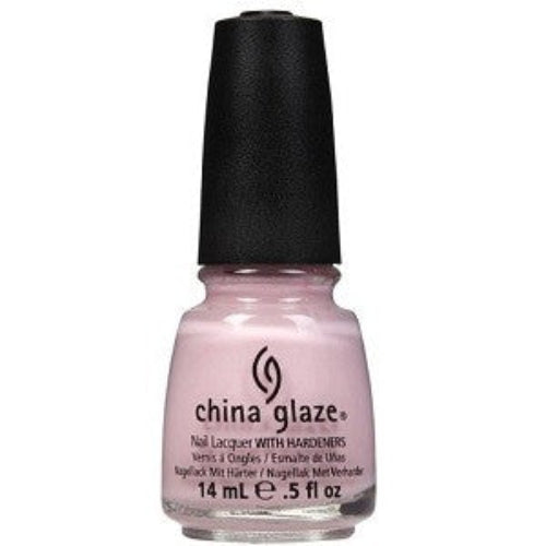 A bottle of China Glaze nail polish in a soft pale pink color, with a black cap.