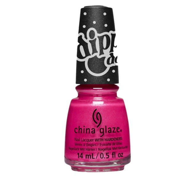 A bottle of China Glaze nail polish in a bright neon pink shade with a silvery white shimmer, and a decorated black and white cap.