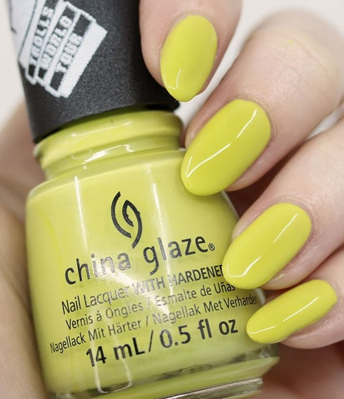 China Glaze yellow/green nail polish bottle with a hand wearing matching yellow nails.