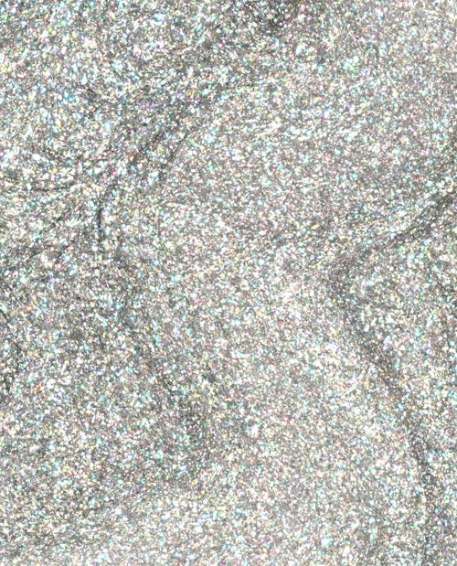 Close-up of a silver holographic shimmer nail polish swatch.