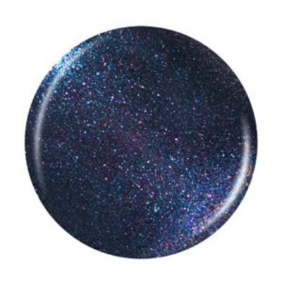 Round nail polish swatch with a speckled blue and purple pattern on a white background