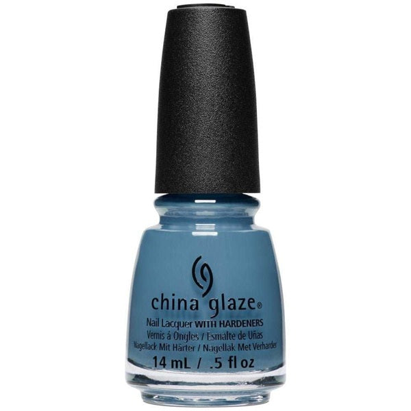 China Glaze blue nail polish bottle on a white background
