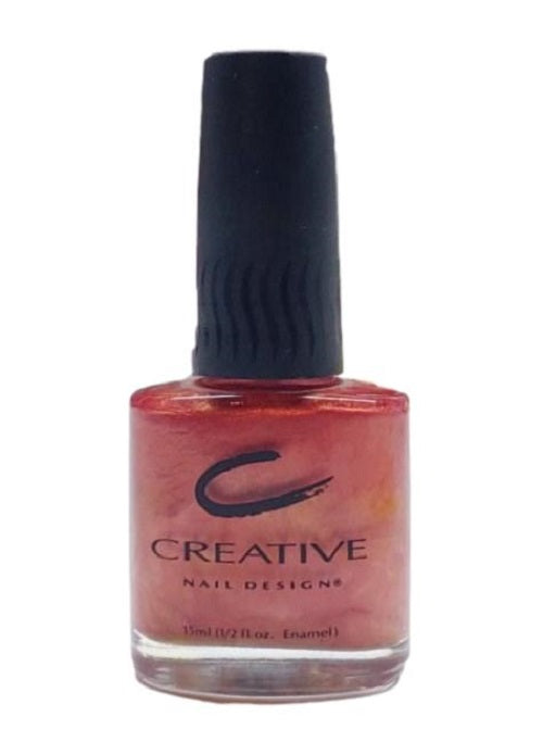 A bottle of Creative Nail Design nail polish in the shade Demure 219, featuring a rosy mauve pink color with gold micro-shimmer.