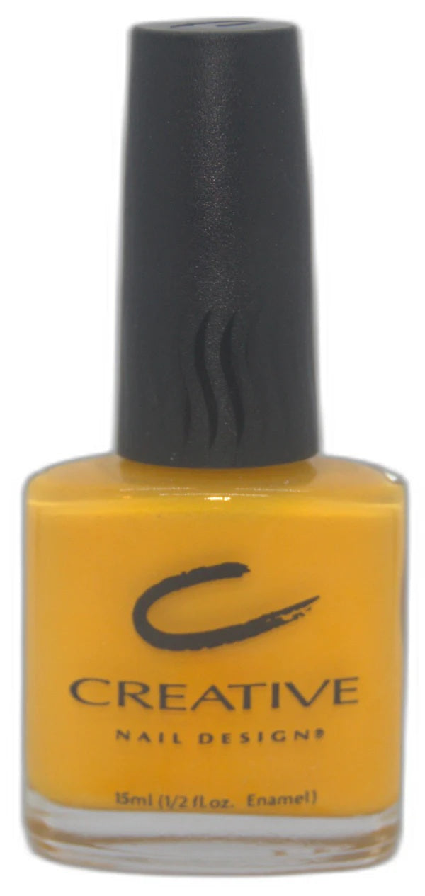 Creative Nail Design yellow nail polish bottle with black cap on a white background