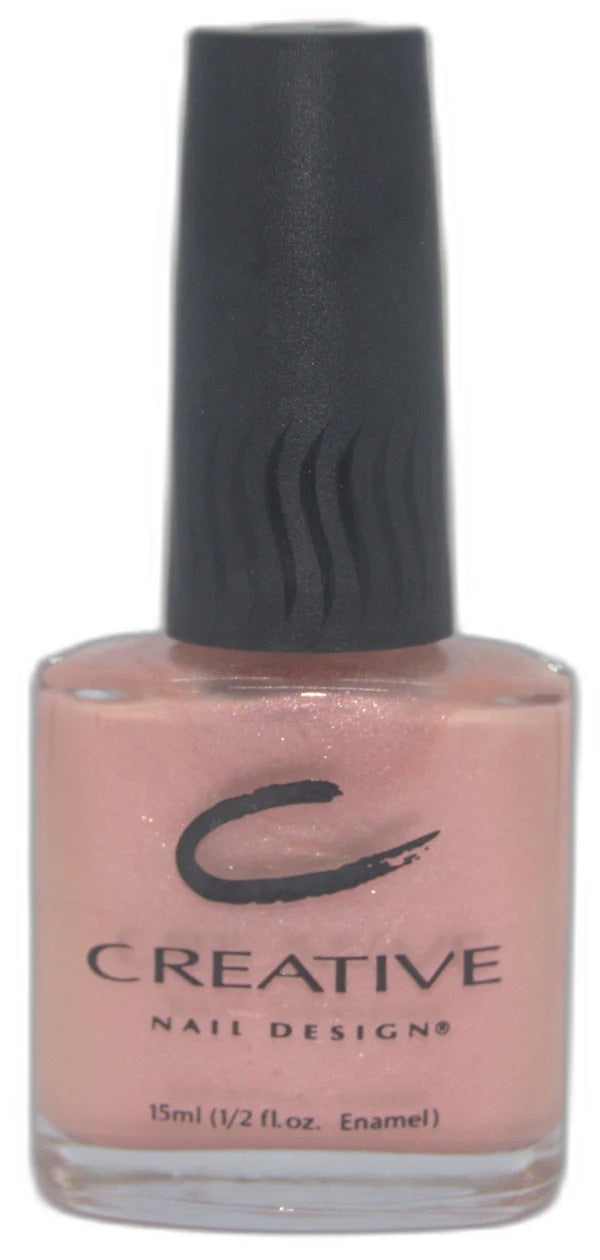 Creative Nail Design nail polish bottle with black cap and pinkish-brown color on a white background.