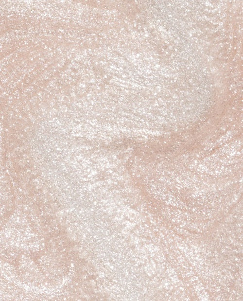 Close-up of an off-white shimmer nail polish swatch.