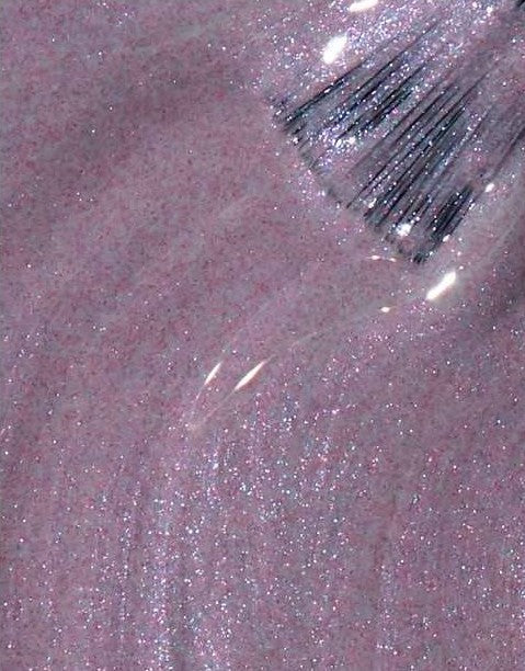Gray lavender shimmer nail polish swatch with brush.