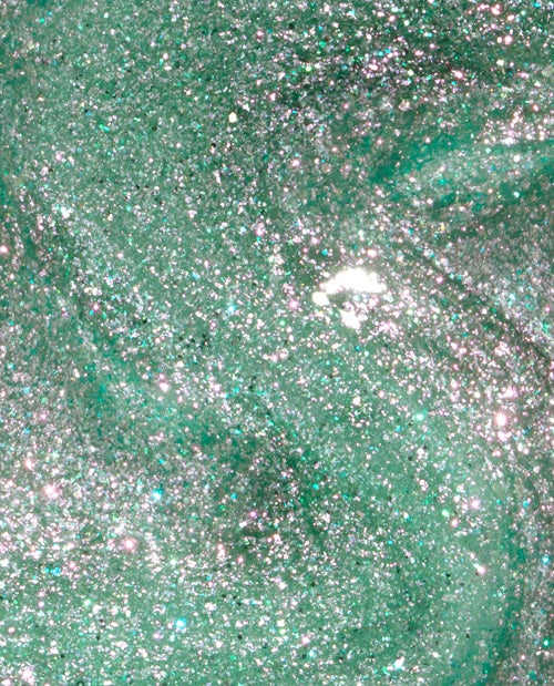 Close-up of a green shimmer nail polish swatch