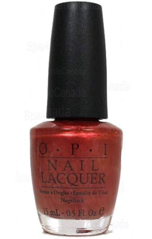 OPI nail lacquer bottle with red polish and black cap on a white background