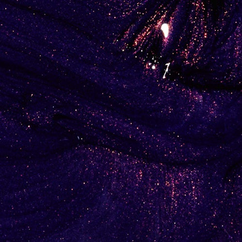 A close-up of purple shimmer nail polish swatch with brush.