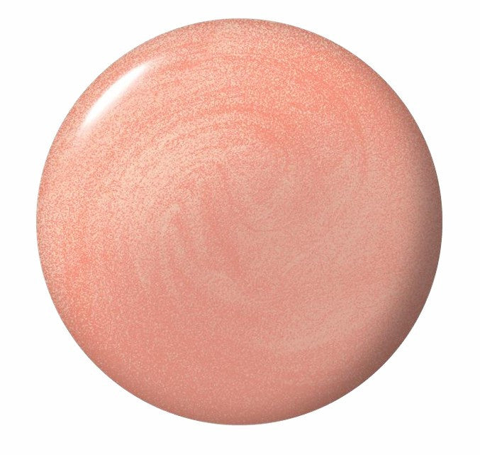 Round peach nail polish swatch on a white background