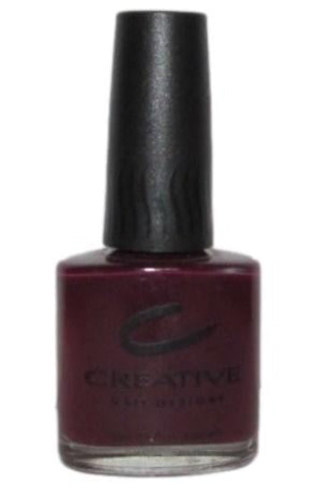 Bottle of Creative Nail Designs nail polish with a dark purple color on a white background
