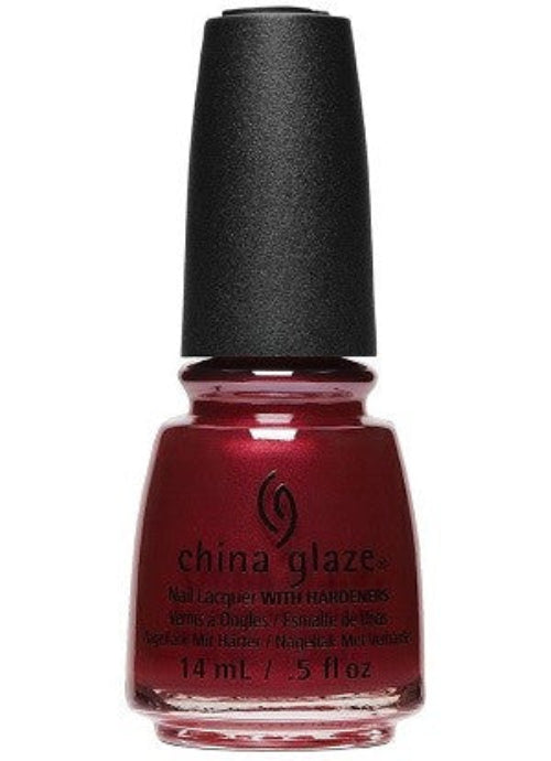 A bottle of China Glaze Matte Nail Polish in the shade Haute Blooded, showing a deep red color with a glossy finish.