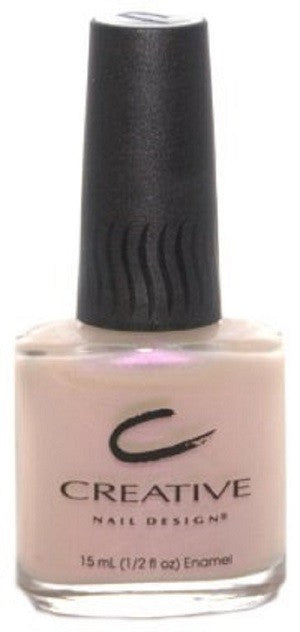 A bottle of Creative Nail Design nail polish in a semi-sheer off-white color with a subtle iridescent pink shimmer, 15 ml in size.
