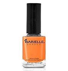 A bottle of Barielle nail polish in a bright tangerine orange creme color, with the brand name and shade number 5049 visible on the label.