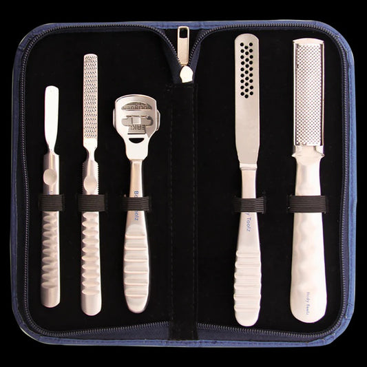 Set of five metal tools in a black case on a white background