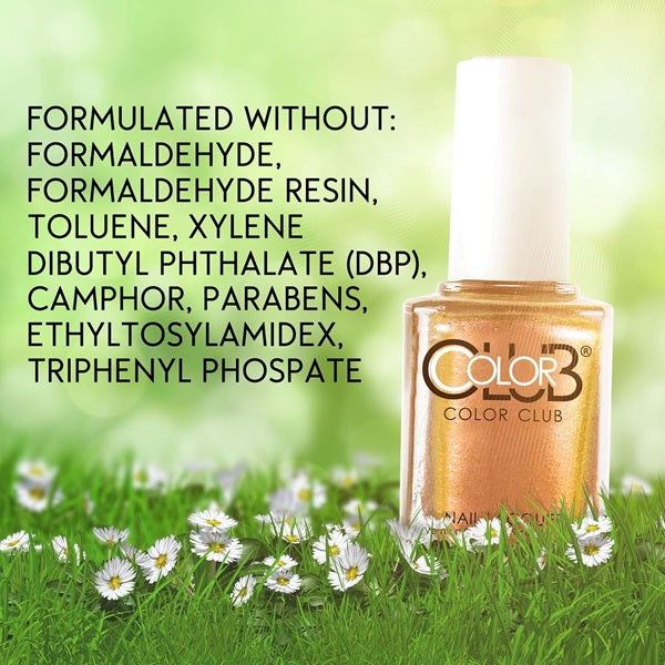 A bottle of gold shimmer nail polish from Color Club stands on grass with white daisies against a soft green blurred background. Black text on the left reads 'FORMULATED WITHOUT: FORMALDEHYDE, FORMALDEHYE RESIN, TOLUENE, XYLENE DIBUTYL PHTHALATE (DBP), CAMPHOR, PARABENS, ETHYLTOSYLAMIDEX, TRIPHENYL PHOSPATE'.
