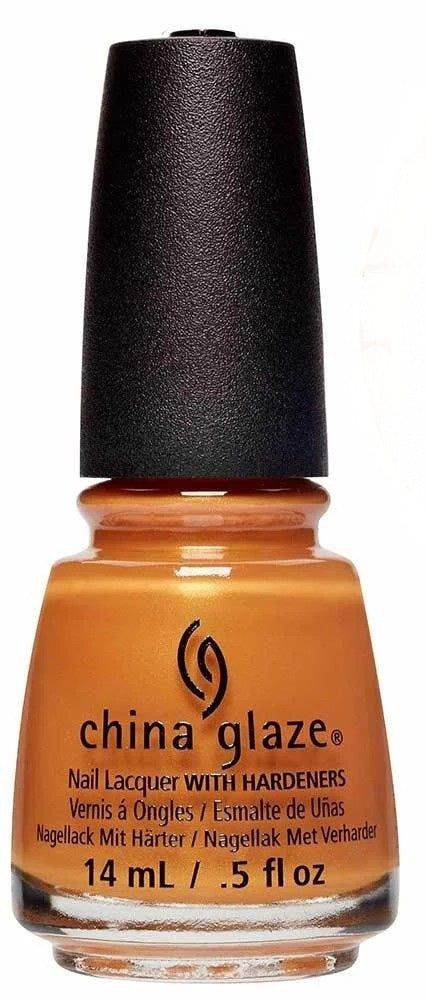 A bottle of China Glaze nail lacquer in a warm orange shade with a black cap.