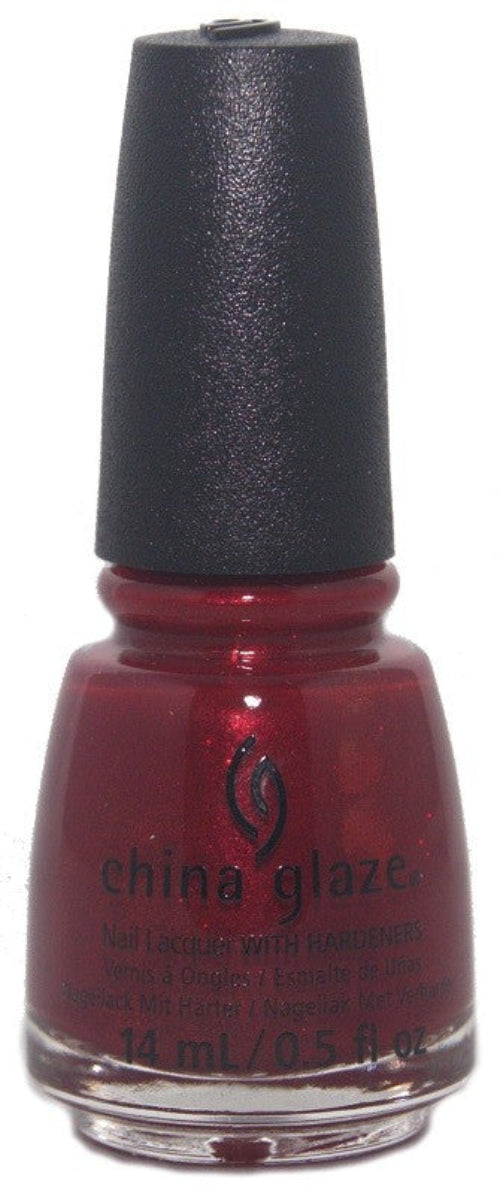 A bottle of China Glaze nail polish in a deep red color with a black cap and visible red micro-glitter.