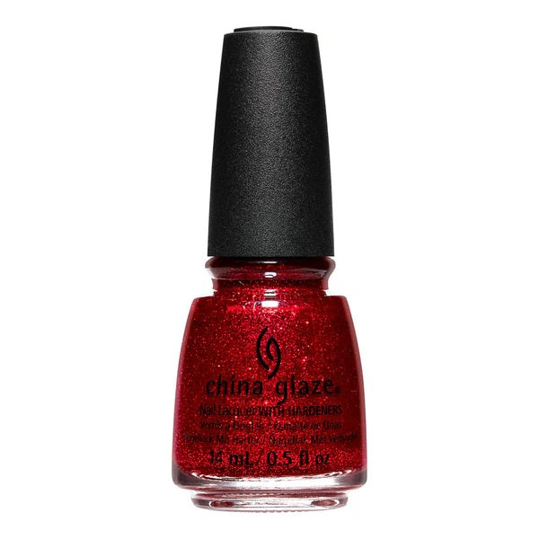 A bottle of China Glaze nail polish in a red color with a glittery and shimmering finish, labeled 'Eat Your Heart Out 1854'.