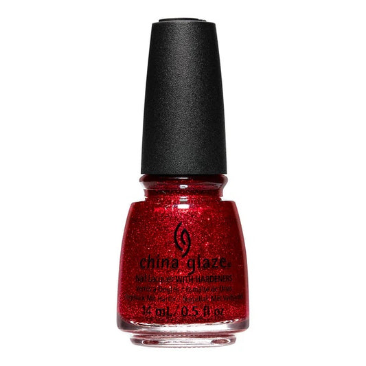 A bottle of China Glaze nail polish in a red color with a glittery and shimmering finish, labeled 'Eat Your Heart Out 1854'.