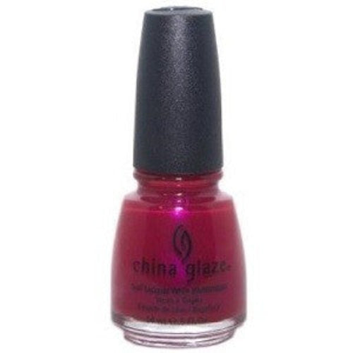 A bottle of China Glaze nail polish in a deep fuchsia pink-toned red shimmer color, with a black cap.