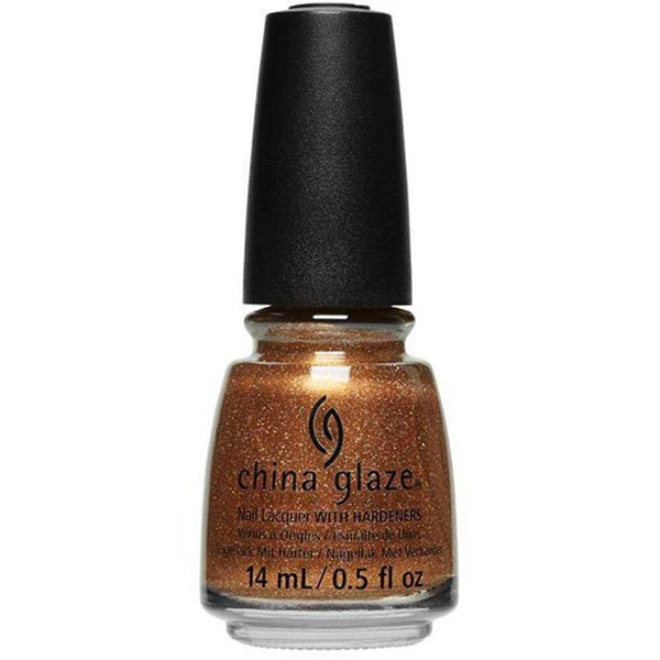 A bottle of China Glaze nail polish in a deep bronze gold color with a strong holographic shimmer.