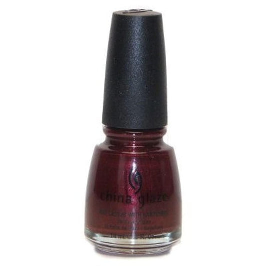 A bottle of China Glaze nail polish in a deep, shimmery burgundy red shade, featuring a black cap, on a plain white background.