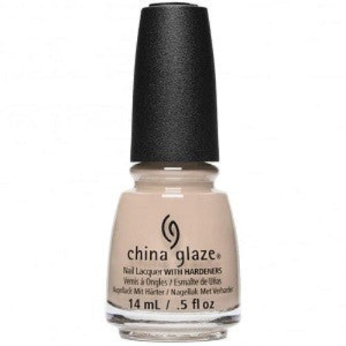 A bottle of China Glaze nail polish in a light sandy beige color, with the brand and product name displayed.