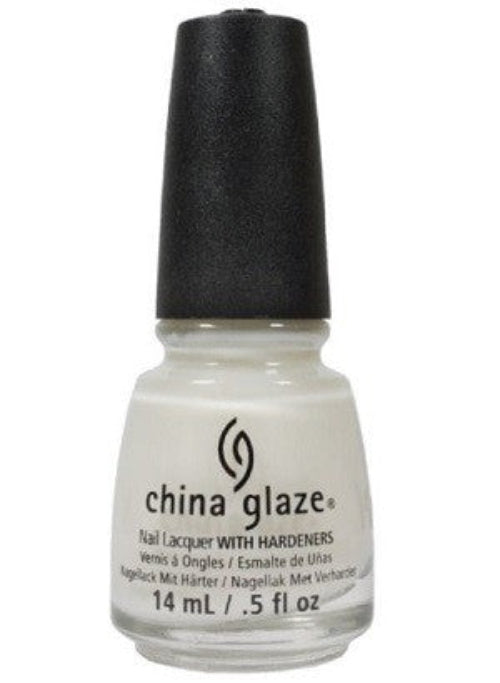 A bottle of China Glaze nail polish in color Moonlight, which is a soft off-white creme color.
