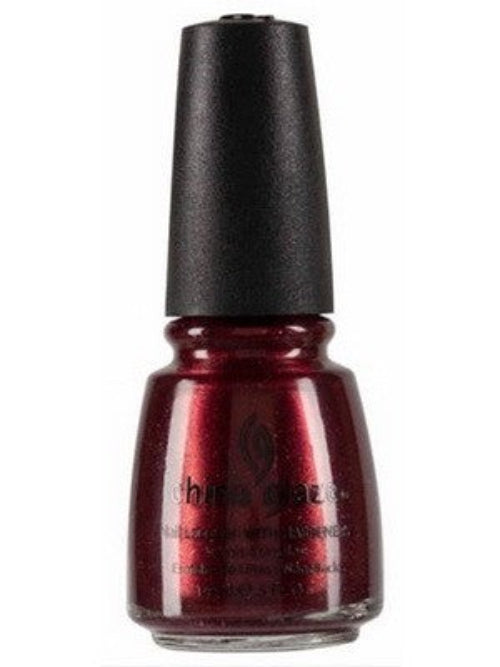A bottle of China Glaze nail polish in a metallic deep red color with a black cap. 