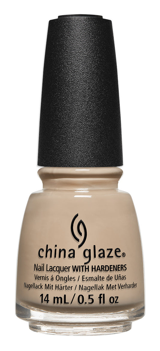 China Glaze beige nail polish bottle with black cap on a white background