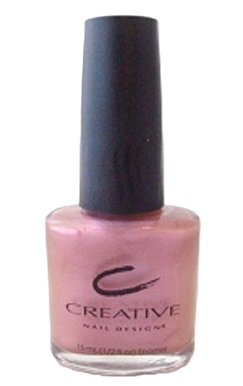 Creative Nail Design pink nail polish bottle with black cap on a white background
