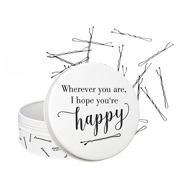 White container with hair pins and 'Wherever you are, I hope you're happy' text on a white background