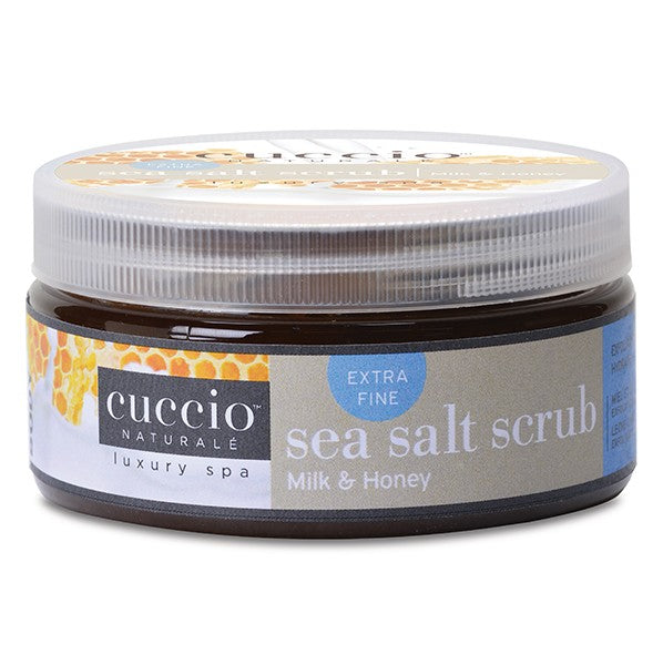 A jar of Cuccio Naturale Milk & Honey Ultra Fine Sea Salt Scrub.
