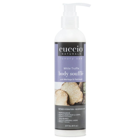 A bottle of Cuccio Naturals White Truffle body soufflé with Morinda & Patchouli, featuring a white pump bottle and a lavender and dark gray label with a photo of sliced white truffle.