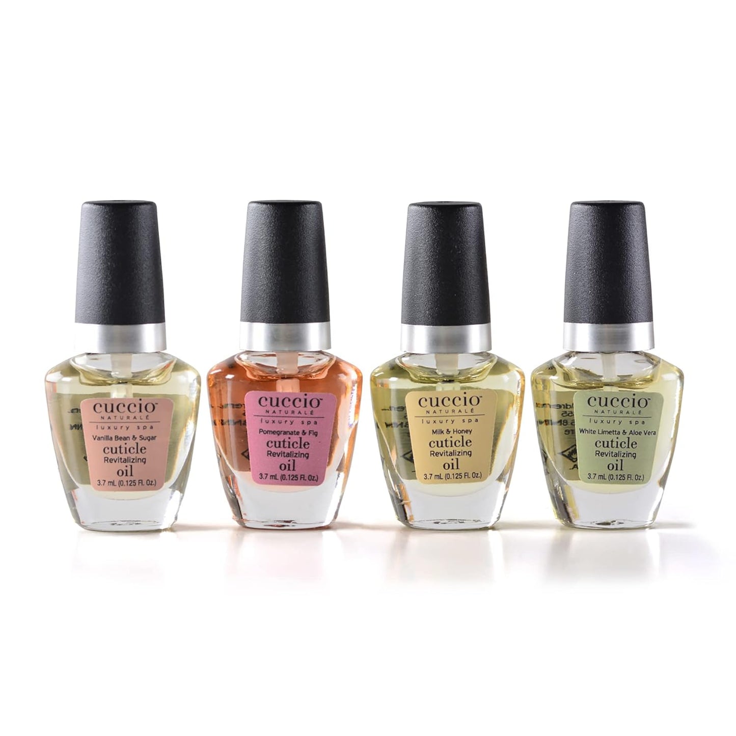Four bottles of Cuccio cuticle oil on a white background