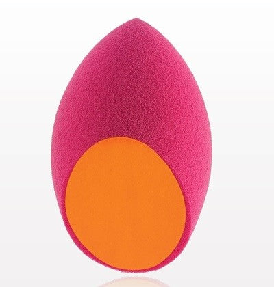 A dual-textured blending sponge with one half pink and the other orange, designed for applying and blending makeup.