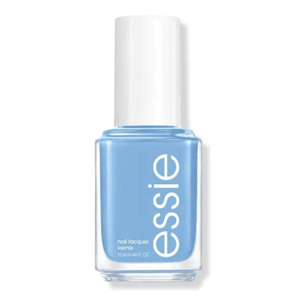 Essie nail polish bottle with blue polish and white cap on a white background