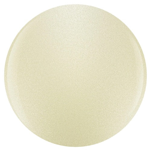 Round light gold nail polish swatch on a white background