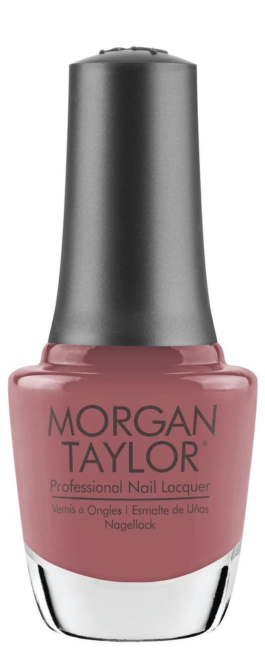 Morgan Taylor Professional Nail Lacquer bottle, mauve color with a black cap.