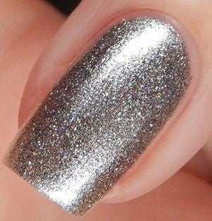 Silver shimmer nail polish swatch painted on nail.