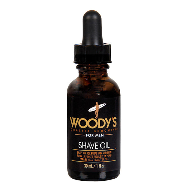 Woody's For Men Shave Oil in a 30 mL amber glass dropper bottle with a black cap and black label featuring gold and white text.