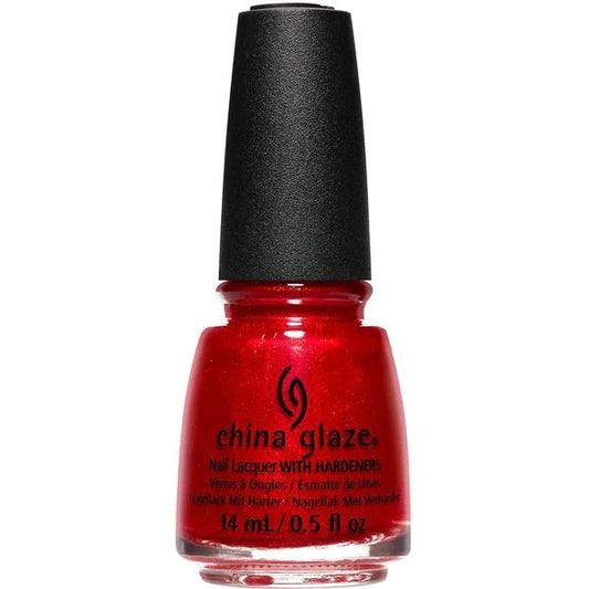 A bottle of China Glaze nail polish in a warm red color with golden shimmer, labeled '2 Hot 2 Handle 1853'