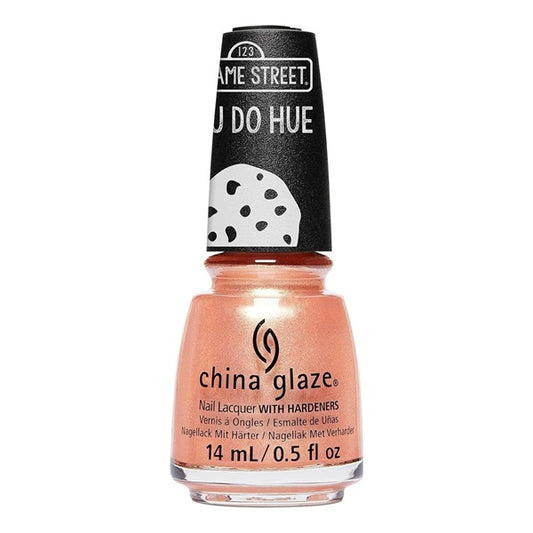 China Glaze peach shimmer nail polish bottle with black cap on a white background