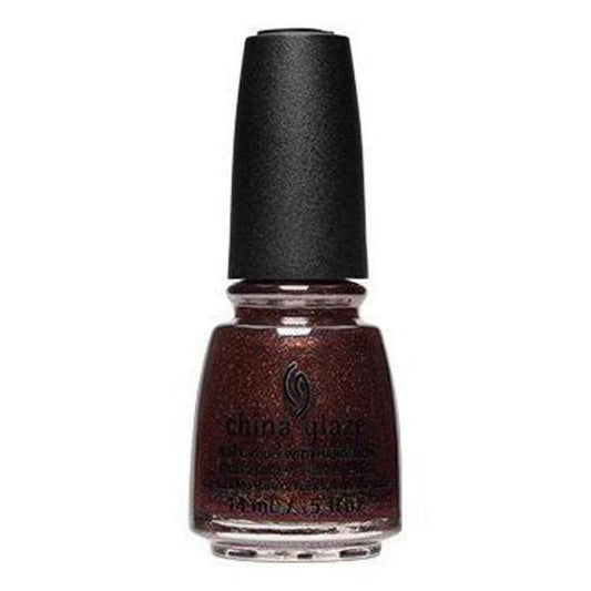 Bottle of dark mulberry wine China Glaze nail polish with a shimmery finish on a white background