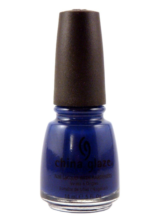 A bottle of China Glaze nail polish in a deep cobalt blue shade, featuring a black cap and black printed branding on the glass, set against a plain white background.