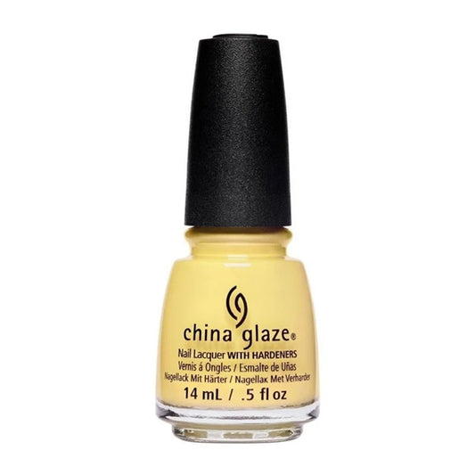 A bottle of China Glaze nail polish in a pale yellow shade, featuring a black cap and clear glass bottle on a white background.