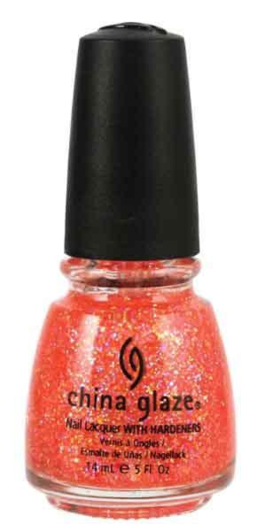 A bottle of China Glaze nail polish in the color Mango Madness with a translucent orange jelly consistency and multicolored glitter.
